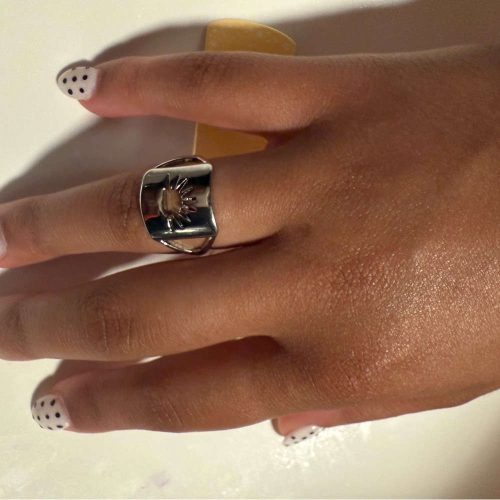 Silver Ring with Sun Design